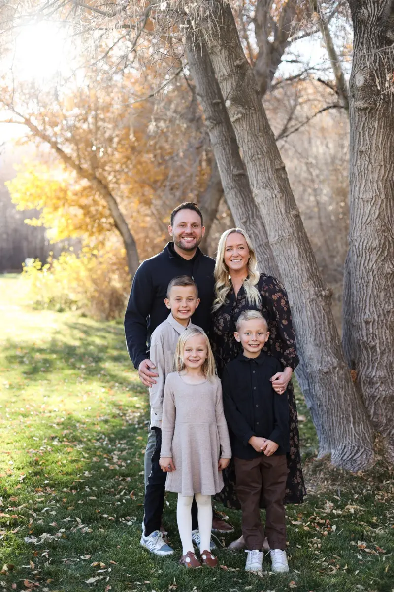 Riley, co-owner of HM Roofing, with family