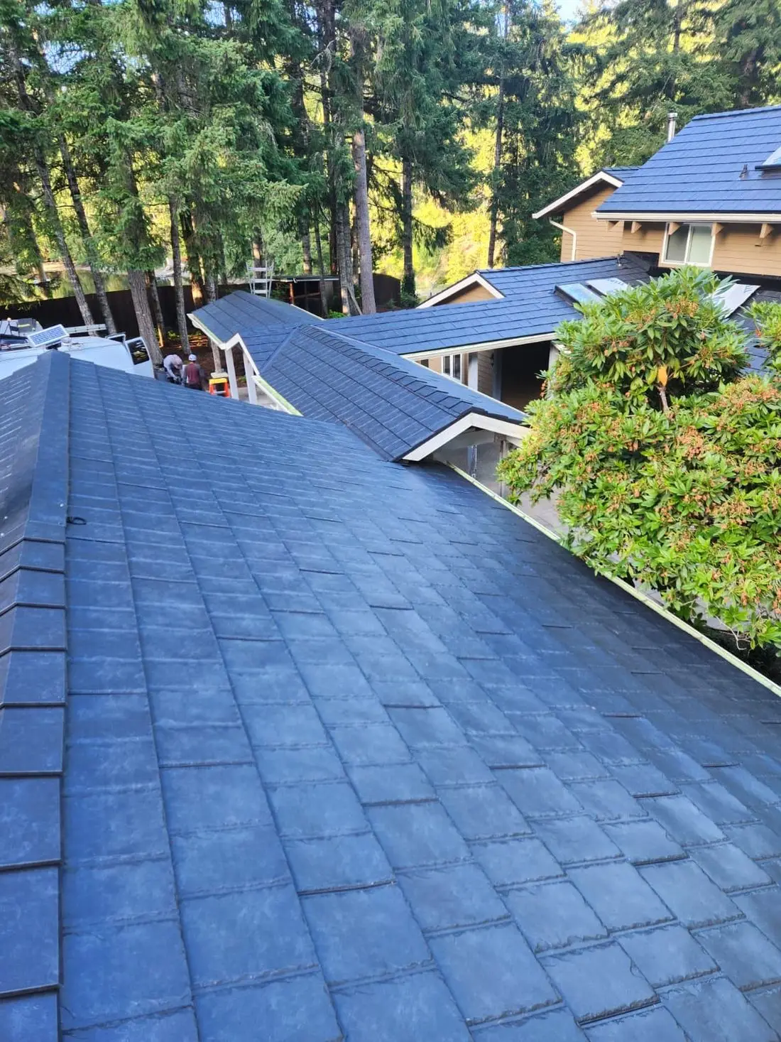 Finished ProVia metal roof on an HM Roofing project, aerial view